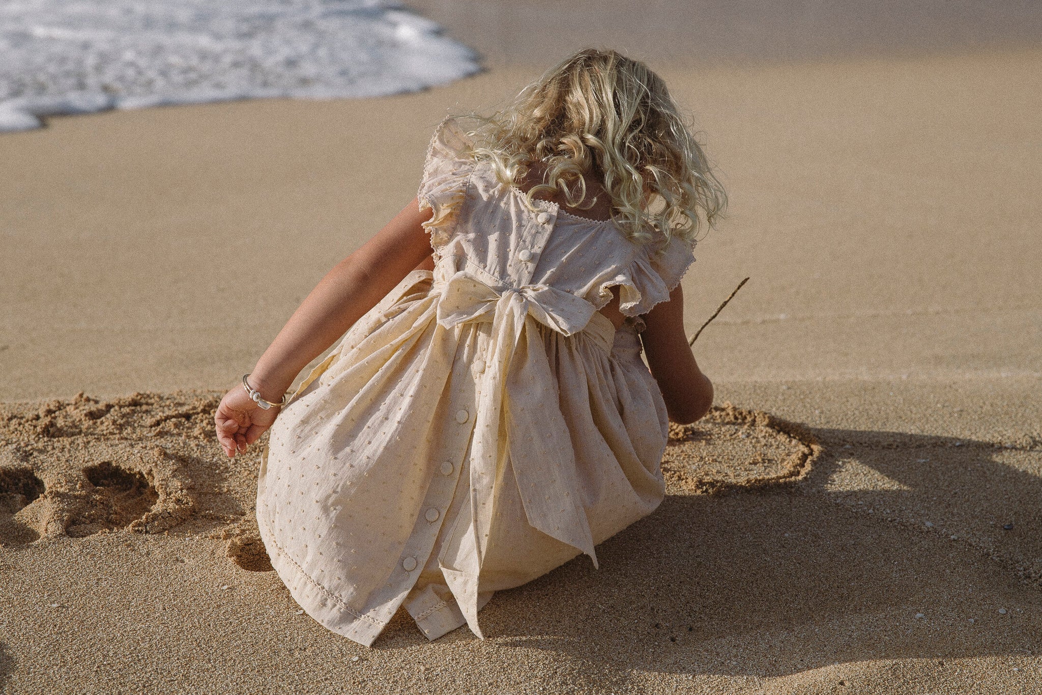 The Penny pinafore in  cream puff