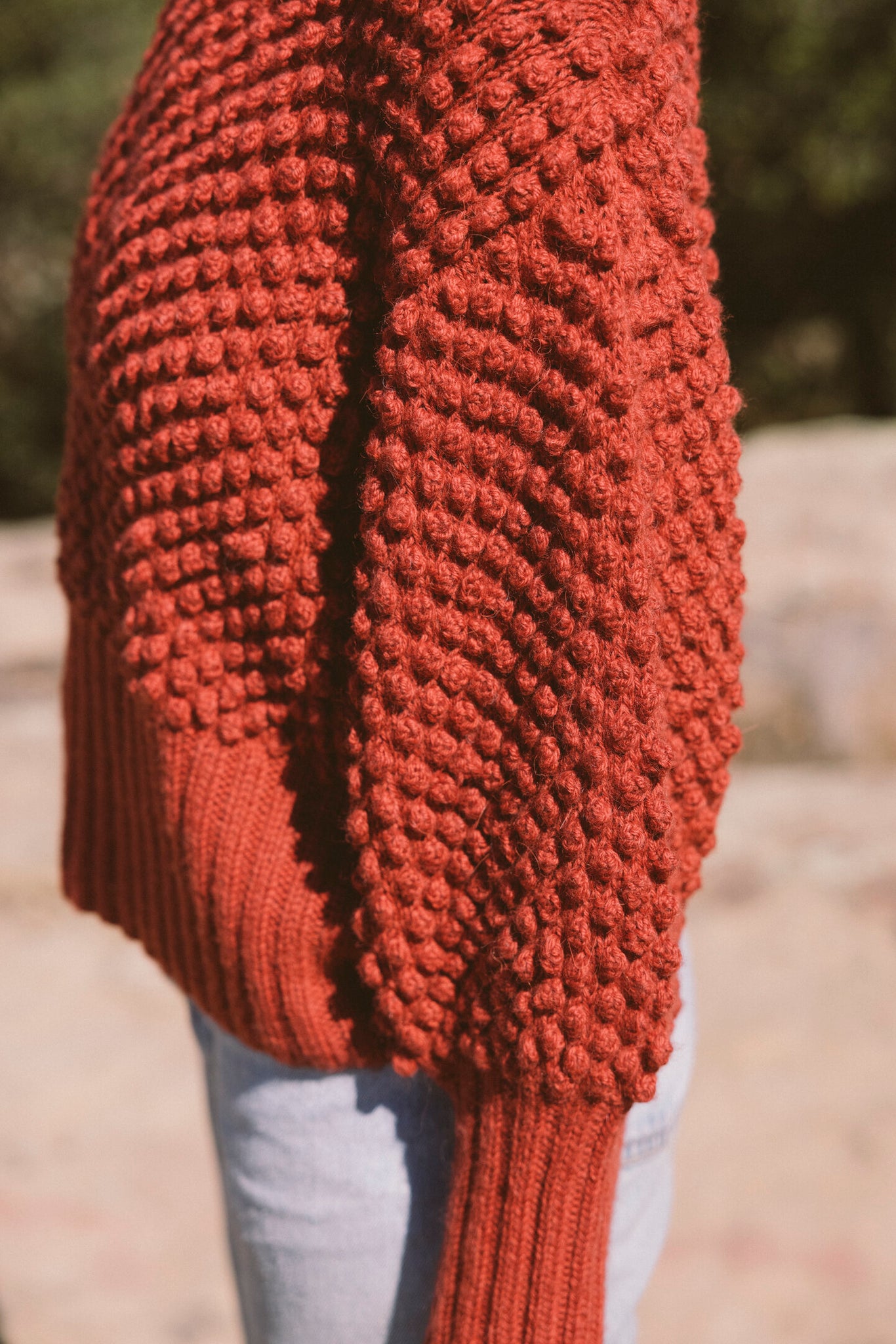 THE HANDKNIT CLOVER SWEATER IN RED EARTH