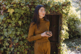 the Tia turtleneck in earth
