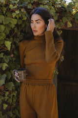 the Tia turtleneck in earth