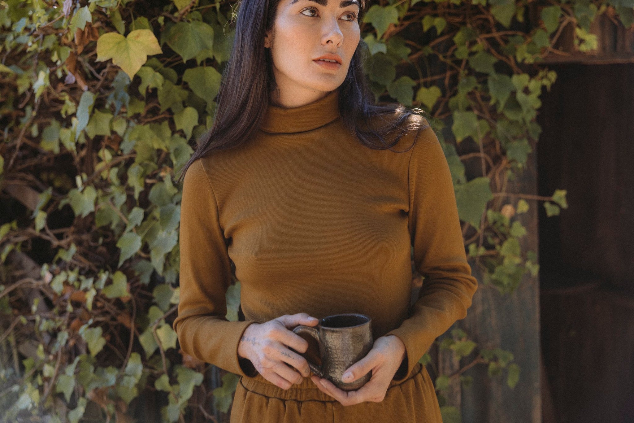 the Tia turtleneck in earth
